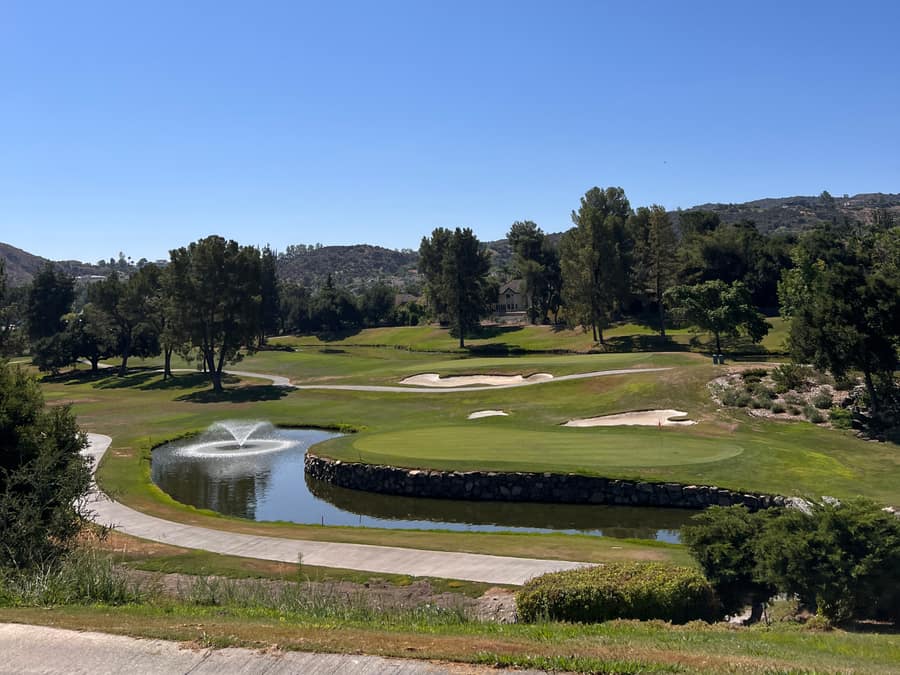 Pond with fountain on the course