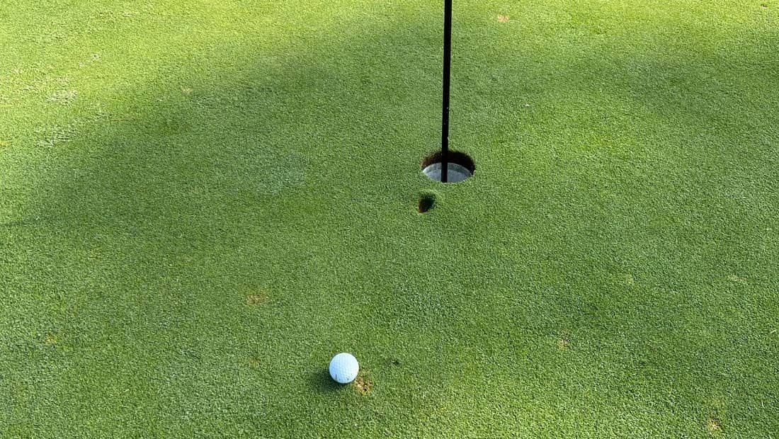 Tournament green with pin flag