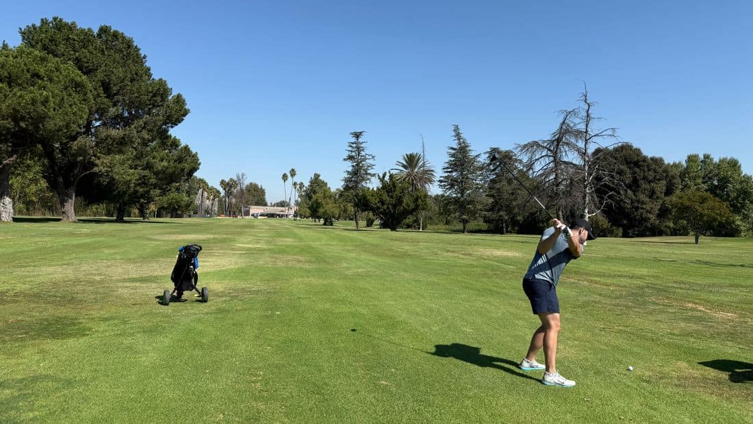 Clubhouse and fairway below the hills